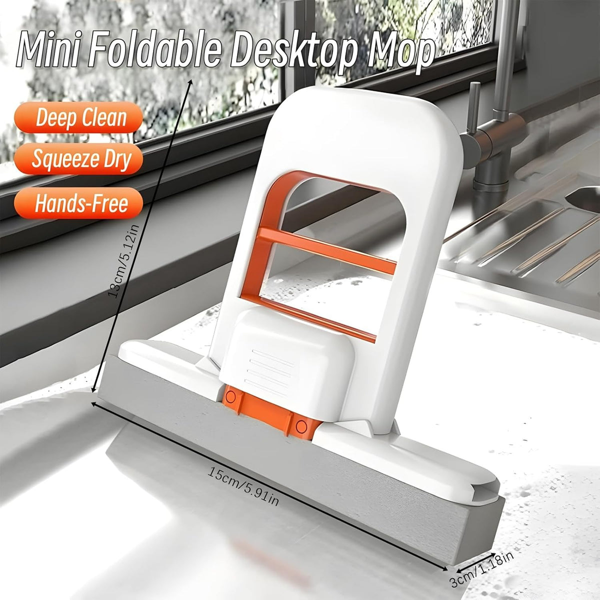 Mini foldable desktop mop with cleaning features on a white surface