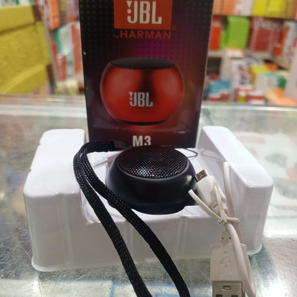 JBL M3 portable speaker with packaging on a store shelf