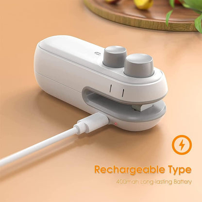 White and gray electronic device with charging cable on a beige surface