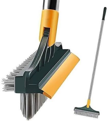 A cleaning tool set on a white background, featuring a close-up of a broom head attachment with yellow and dark green plastic components and metal bristles, alongside a long-handled rake with a similar yellow and dark green handle.