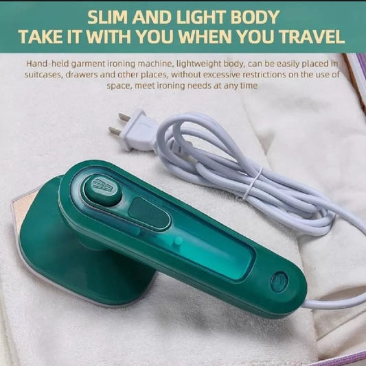 Green handheld garment iron on a white surface with text about its portability.