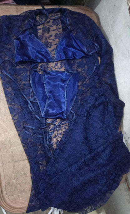 Blue lace lingerie set on a textured surface