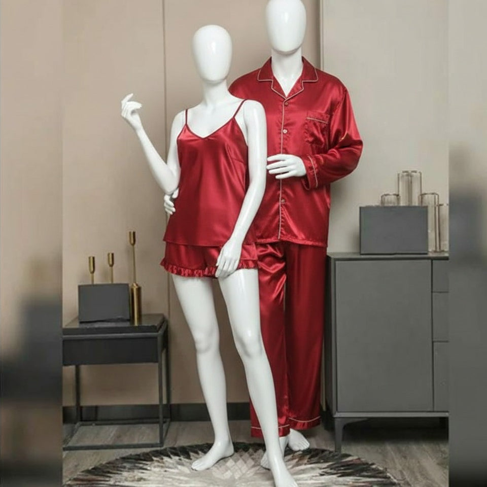 Red satin pajama set on mannequins against a neutral background