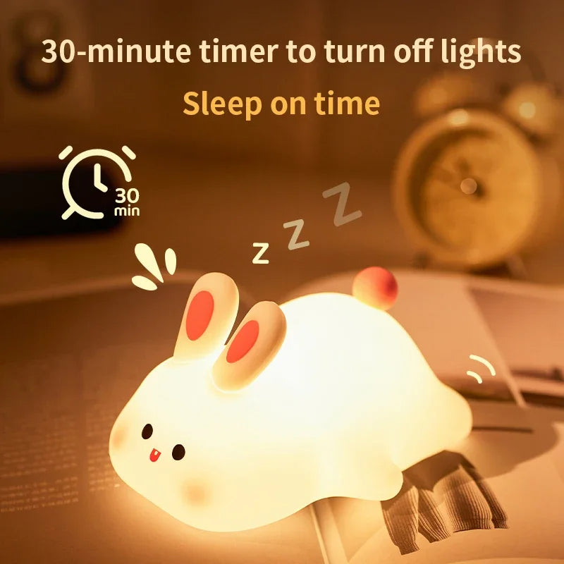 Cute rabbit-shaped night light with a 30-minute timer on a blurred background