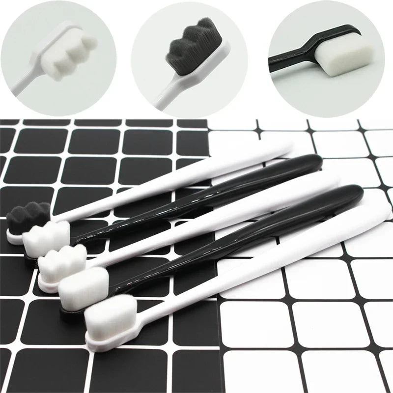 Set of black and white makeup brushes on a black and white checkered background