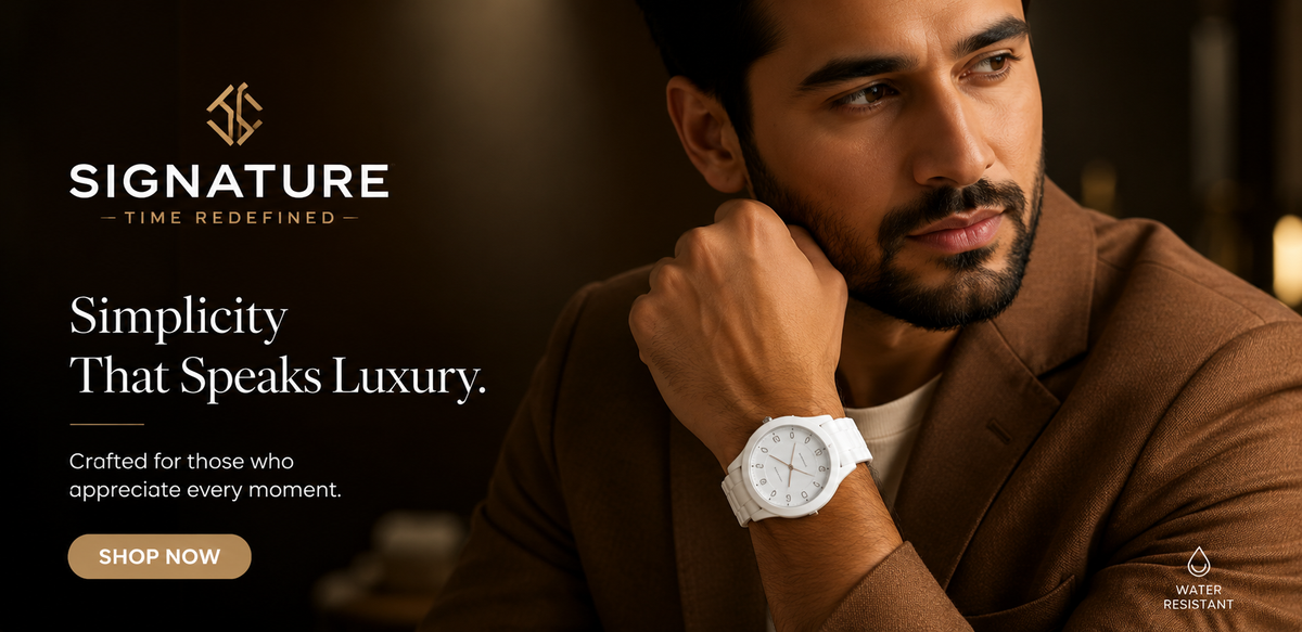 A man in a brown blazer wearing a white watch with a white dial and white bezel, posed in a dimly lit indoor setting. The left side features a dark promotional banner with the brand name 'SIGNATURE' and the text 'Simplicity That Speaks Luxury.