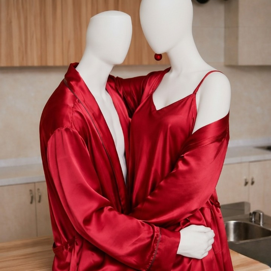 Red satin robe and dress on mannequins in a kitchen setting